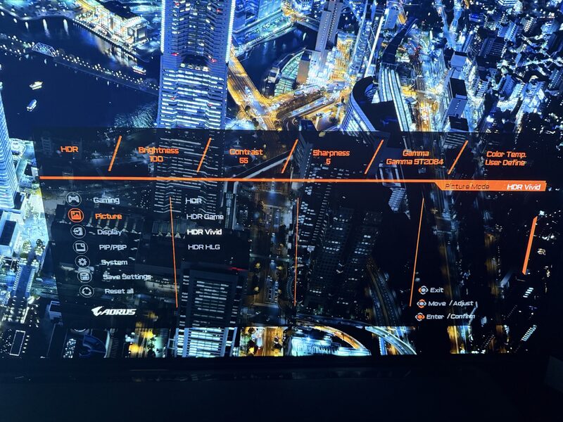 AORUS FO48U OSD Picture menu showing HDR Vivid mode, Brightness 100, Contrast 55, Sharpness 5, Gamma ST2084 PQ curve, Color Temp User Define