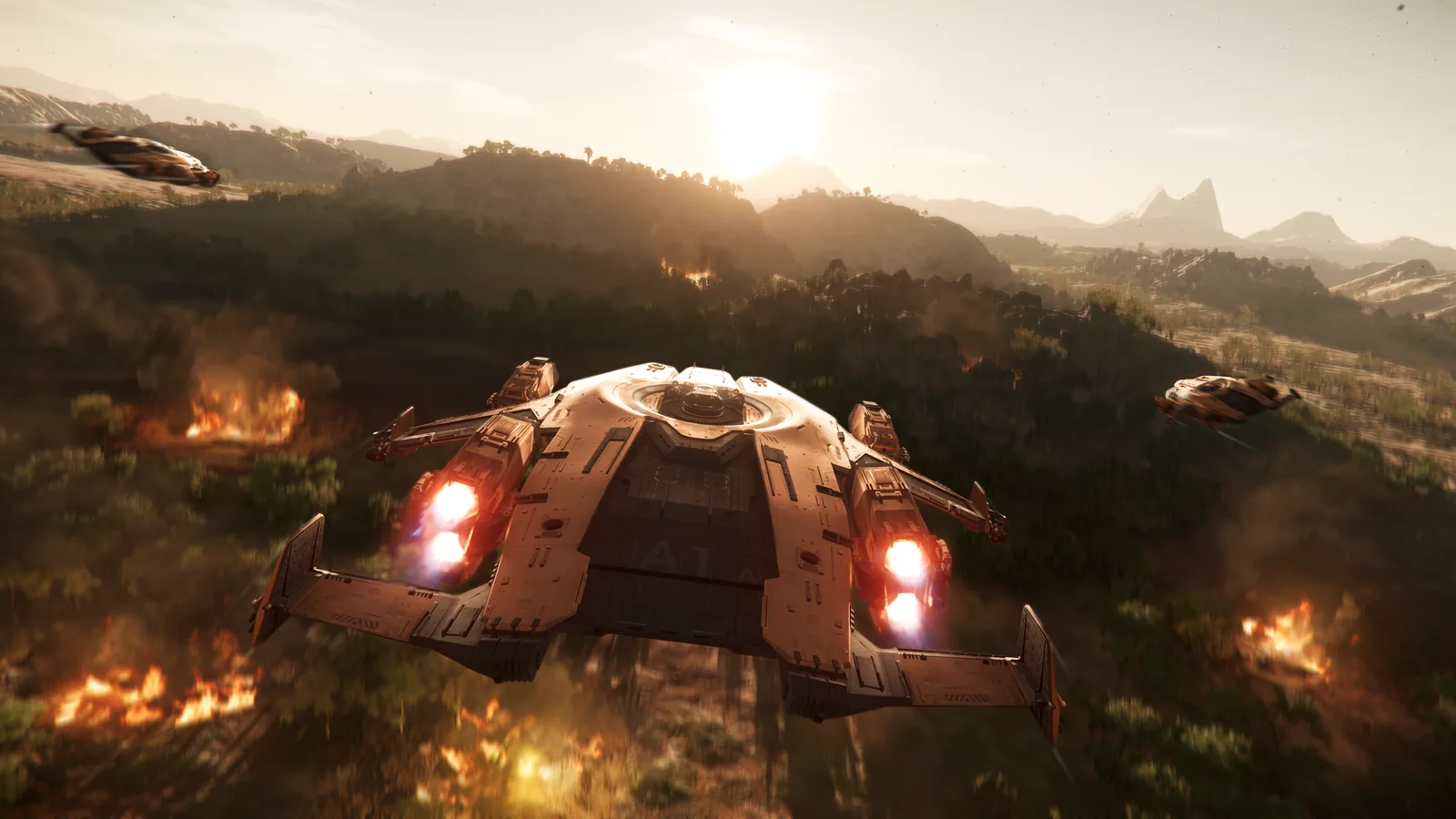 Star Citizen screenshot: an ANVIL Valkyrie dropship flying low over the scrubland of planet Hurston at sunset, fires burning below